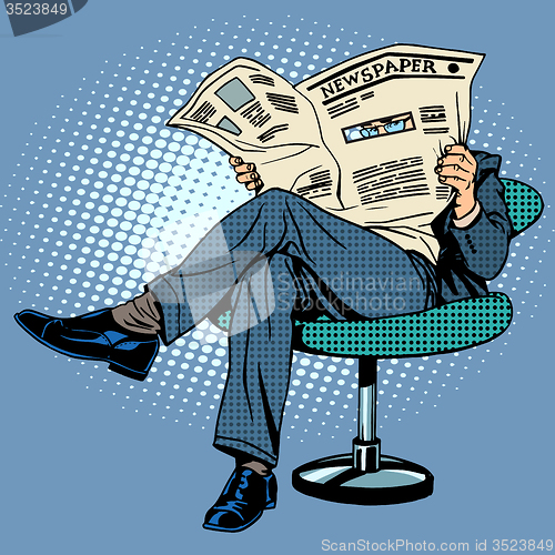 Image of Newspaper reading man