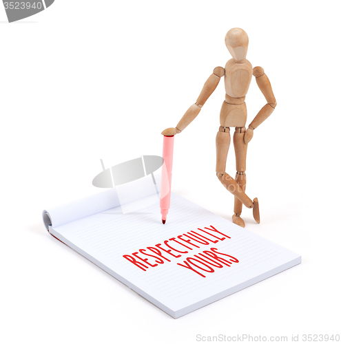 Image of Wooden mannequin writing - Respectfully yours