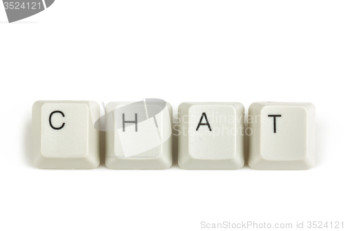 Image of chat from scattered keyboard keys on white