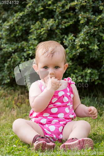 Image of Happy cute little girl outdoor