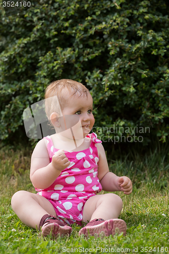 Image of Happy cute little girl outdoor