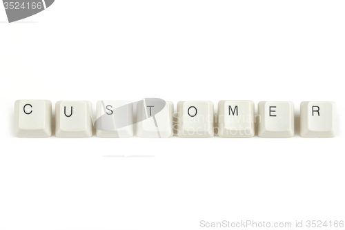 Image of customer from scattered keyboard keys on white