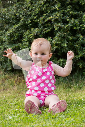 Image of Happy cute little girl outdoor