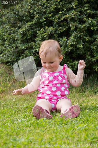 Image of Happy cute little girl outdoor