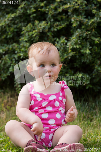 Image of Happy cute little girl outdoor