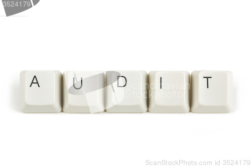 Image of audit from scattered keyboard keys on white