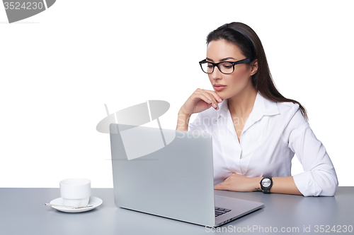 Image of Business woman working online on a laptop