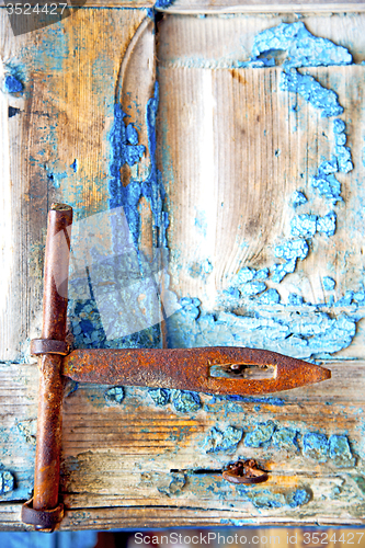 Image of   in africa the old wood  facade home and safe padlock 