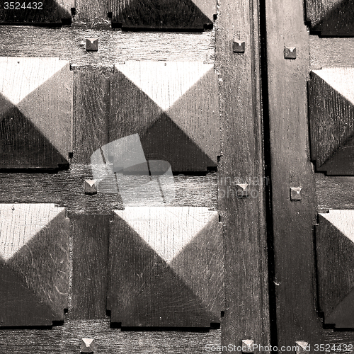 Image of  traditional   door    in italy   ancian wood and traditional  t