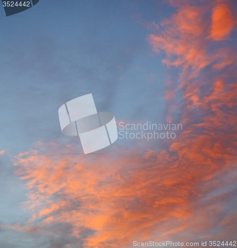 Image of light  the sunrise in  colored sky white soft clouds and abstrac