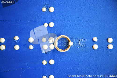 Image of blue  in texture wall and   abstract