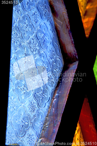 Image of colorated glass   sun in   africa window and light