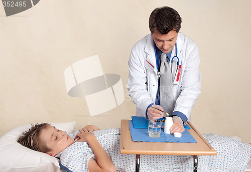 Image of Doctor preparing medication dose