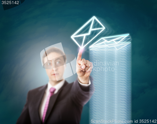 Image of Overworked Manager Stacking Virtual Documents