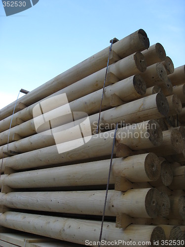 Image of Kiln dried machine rounded poles.