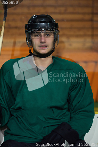 Image of ice hockey players on bench