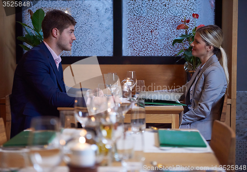 Image of business couple having dinner