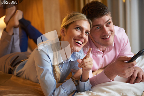 Image of young couple in modern hotel room