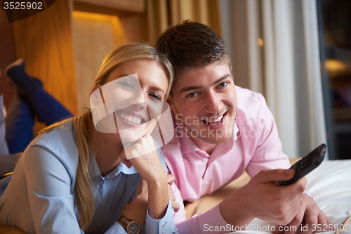 Image of young couple in modern hotel room