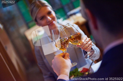 Image of business couple having dinner