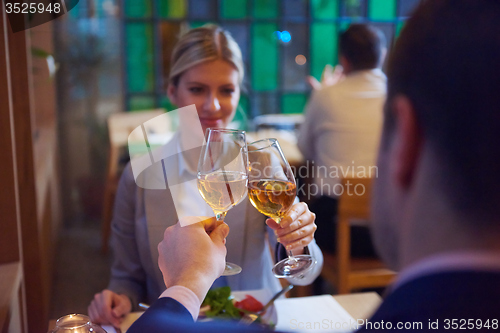 Image of business couple having dinner