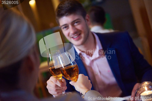 Image of business couple having dinner