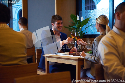 Image of business couple having dinner