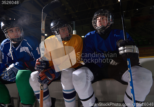 Image of ice hockey players on bench