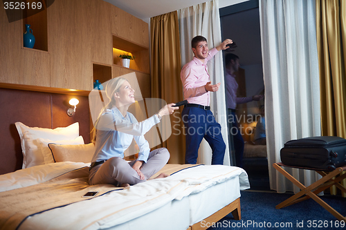 Image of young couple in modern hotel room