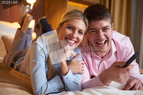 Image of young couple in modern hotel room