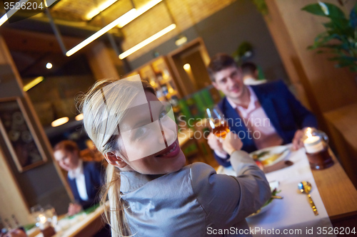 Image of business couple having dinner