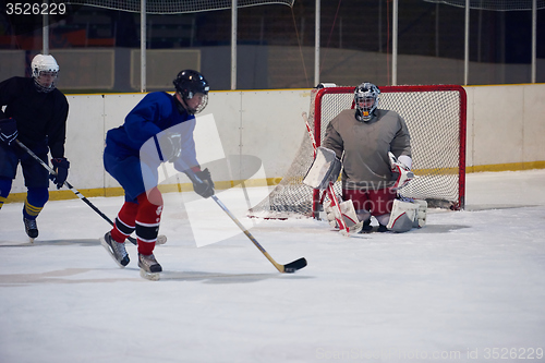 Image of ice hockey players team meeting with trainer
