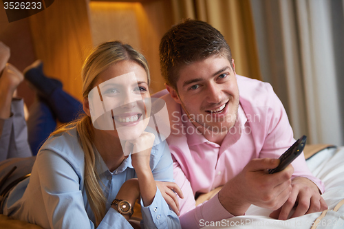 Image of young couple in modern hotel room