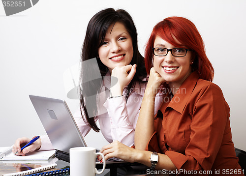 Image of Two businesswomen are working