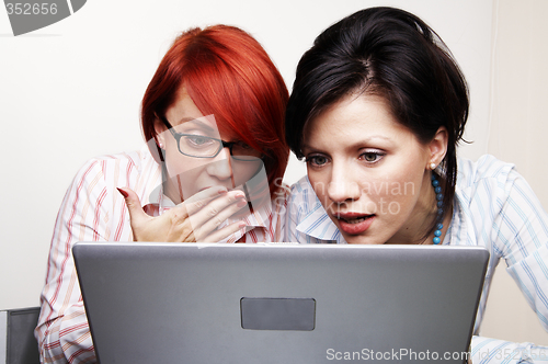 Image of Two businesswomen are very surprised