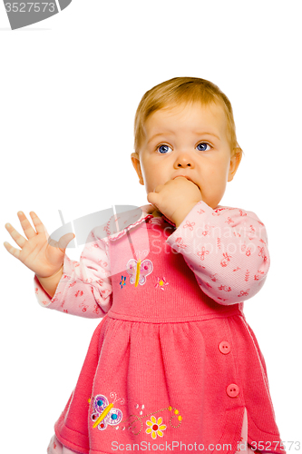 Image of Beautiful baby girl standing. Studio