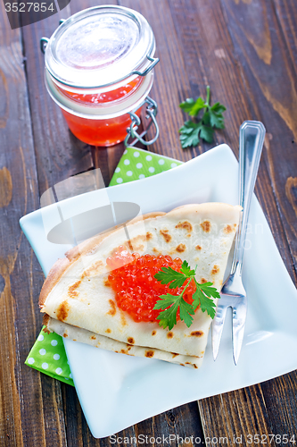 Image of pancakes with salmon caviar