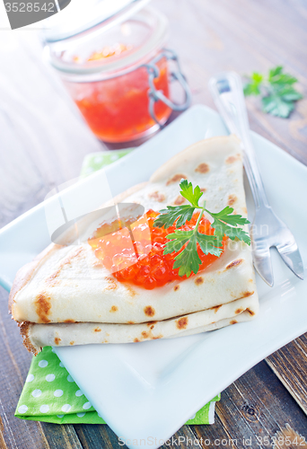 Image of pancakes with salmon caviar