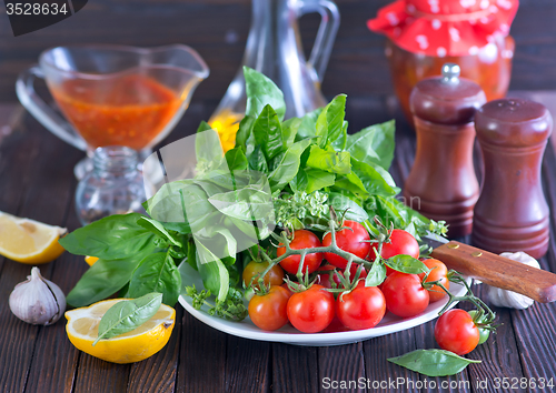 Image of fresh tomato with basil 