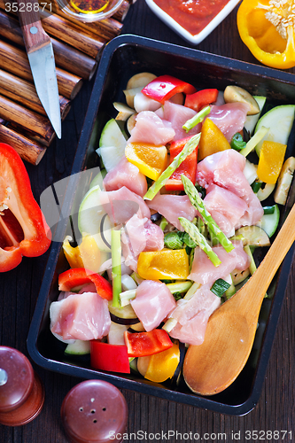 Image of raw meat with vegetables 