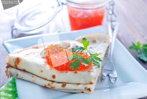 Image of pancakes with salmon caviar