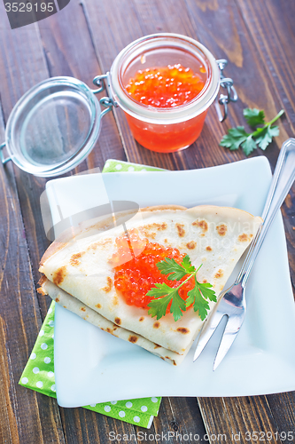 Image of pancakes with salmon caviar