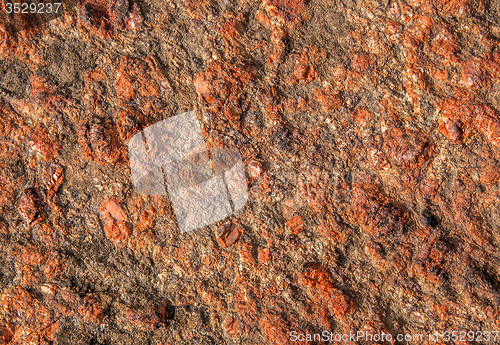 Image of Background of red granite with a rough surface