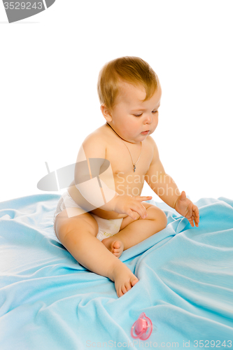 Image of baby in diapers. Studio