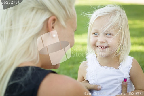 Image of Cute Little Girl Having Fun With Her Mother