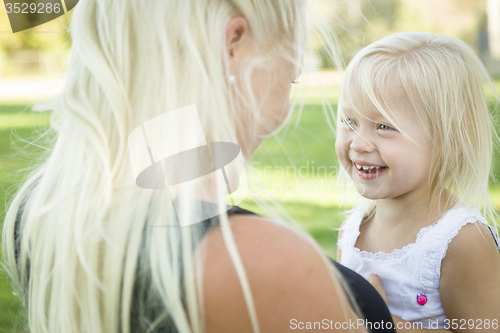 Image of Cute Little Girl Having Fun With Her Mother