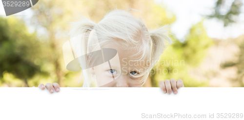Image of Cute Little Girl Holding White Board with Room For Text