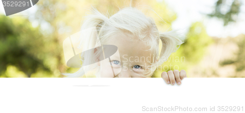 Image of Cute Little Girl Holding White Board with Room For Text