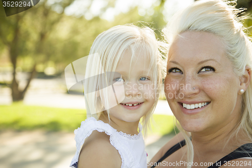 Image of Cute Little Girl Having Fun With Her Mother