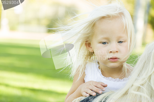 Image of Meloncholy Portrait of Cute Little Girl Outside